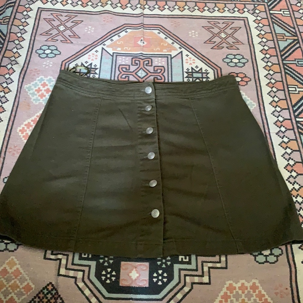 green mini skirt